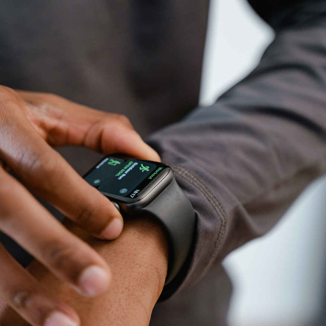 Athletic man exercising outdoors with earbuds